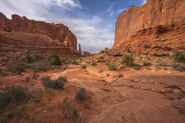 hiking the park avenue trail in arches national park, utah, usa