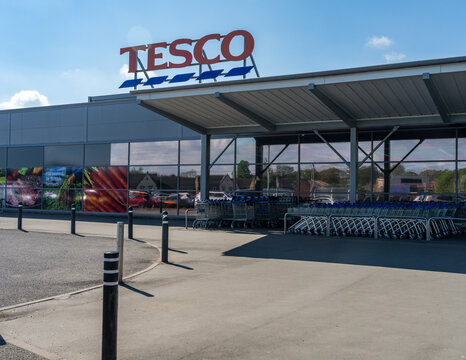Ellesmere, Shropshire - 12 May 2023: Entrance to Tesco supermarket on sunny day in England