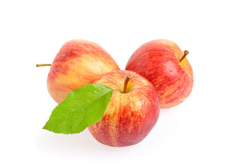 Red apple with a green leaf. Isolated on white background