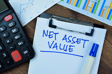Concept of Net Asset Value write on paperwork isolated on Wooden Table.