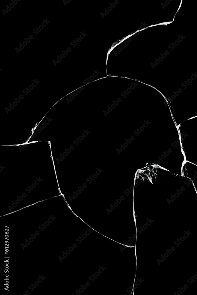 Poster light texture of cracks of broken glass on a black background. broken window effect.