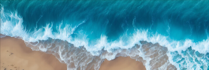 Overhead view of crashing waves on a sand shoreline. Tropical beach surf. Abstract aerial ocean view.