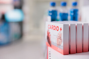 Empty drugstore retail store with cardiology pills packages and treatment on shelves, used by clients to buy healthcare drugs and pharmaceutical products. Pharmacy with supplements and medication