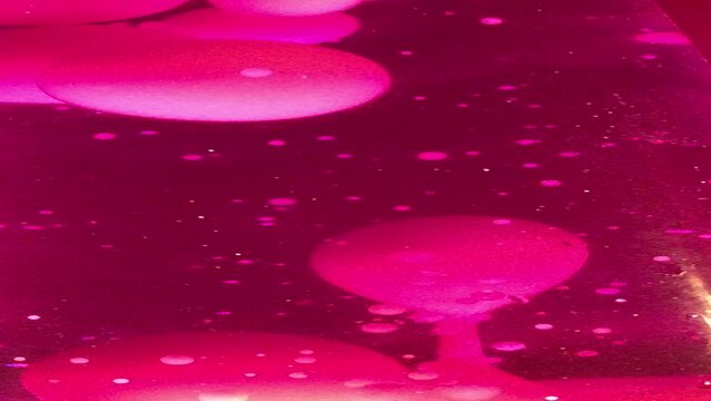 Lava lamp closeup 70s style pink lava lamp liquid background stock footage with copy space