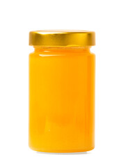 Fresh honey in a jar on a white isolated background.