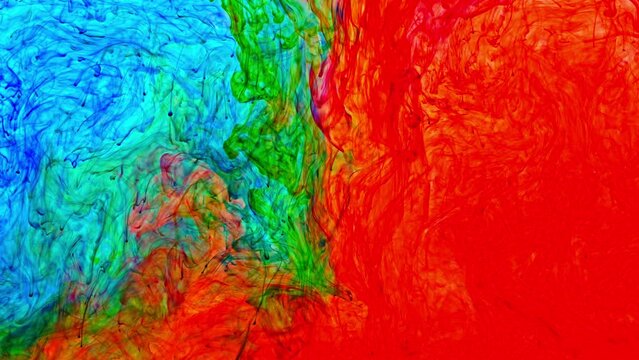 Amazing The bright orange covers the area and mixes with the green..The orange mass pushes the green mass.Orange and green are opposite colors..The color slowly dissolves in water and blends 
