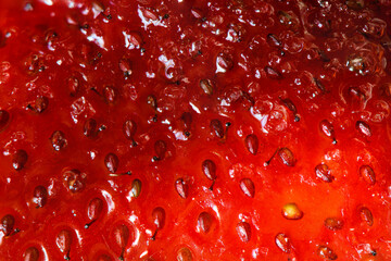 Macro photo of a strawberry. Texture of strawberries close up. Seamless texture. Fresh healthy food.