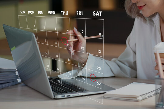 Highlight Reminder Appointment for the Calendar and the Organizer's Agenda Booking Meeting Appointment On Laptop Computer Online Reminder Schedule Event