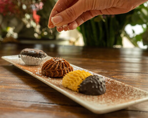 Savor the Flavors of Arabia: Authentic Cuisine in a Rustic Woodland Setting. Arabian Feast: Traditional Delicacies on a Rustic Wooden Table Surrounded by Greenery. Taste the Essence of Arabia.