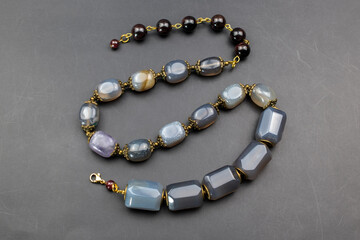Statement stone bead necklace, massive unusual handmade jewelry, promotional photo for an online jewellery store