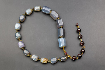 Statement stone bead necklace, massive unusual handmade jewelry, promotional photo for an online jewellery store