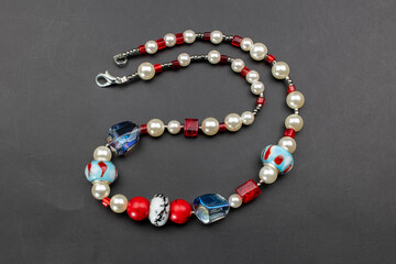 Unique colorful gemstone necklace, handmade jewelry concept, promotional photo for an online jewelry store