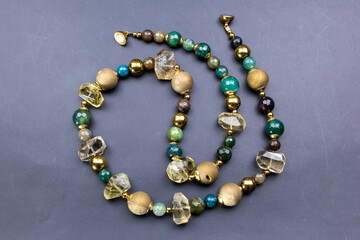 Unique colorful gemstone necklace, handmade jewelry concept, promotional photo for an online jewelry store