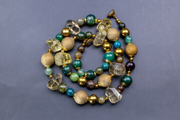 Unique colorful gemstone necklace, handmade jewelry concept, promotional photo for an online jewelry store