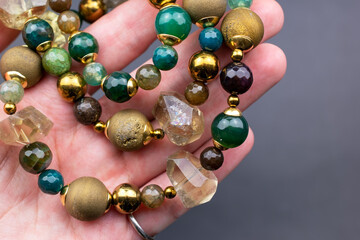 Unique colorful gemstone necklace, handmade jewelry concept, promotional photo for an online jewelry store