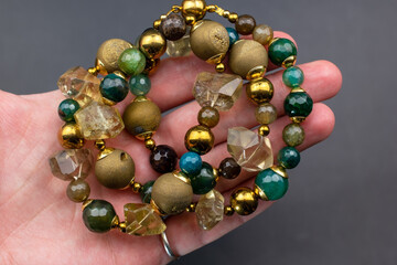 Unique colorful gemstone necklace, handmade jewelry concept, promotional photo for an online jewelry store