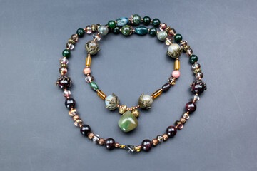 Unique colorful gemstone necklace, handmade jewelry concept, promotional photo for an online jewelry store