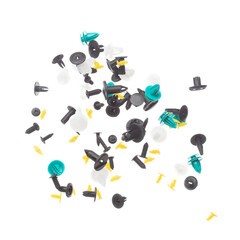 Car fender rivets fly explosion, colorful automobile fender rivets float explode, abstract cloud fly. Automobile plastic rivets splash throwing in Air. White background Isolated