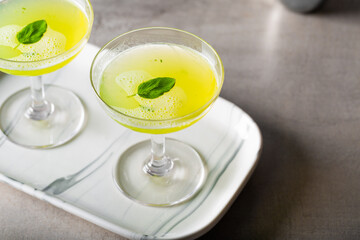 Boozy Gin Basil Smash cocktail gin, lemon juice, syrup and basil leaves