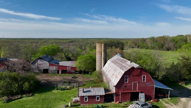 Aerial Virginia farm rural red barn silo grain elevator 2. Rural community Spotsylvania County, Virginia, near Fredericksburg. Battle grounds of American Civil War. Agriculture, meadows, farms.