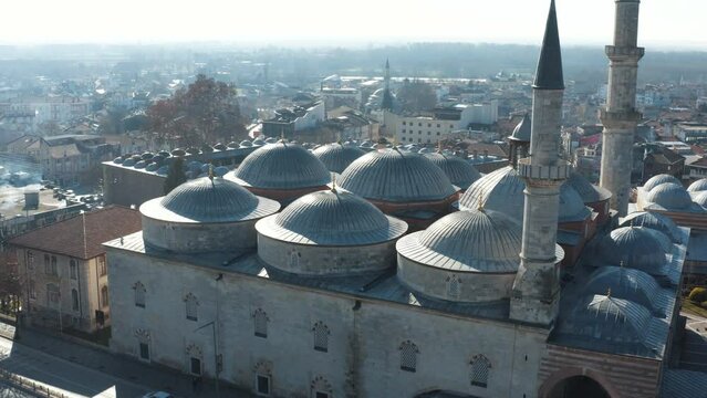 4K footage of Old Mosque in Edirne from drone during daylight. Aerial footage of Eski Cami and historical Ottoman landmarks of Edirne. Close-up drone shot at lead mosque domes stock video.