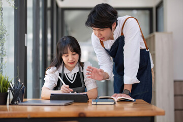 Two happy male and female university students collaborating on a project in campus. Education, Learning and technology concept