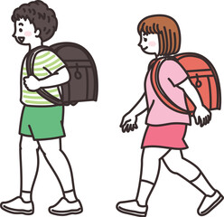 ランドセルを背負って歩く小学生の男女　登校　通学