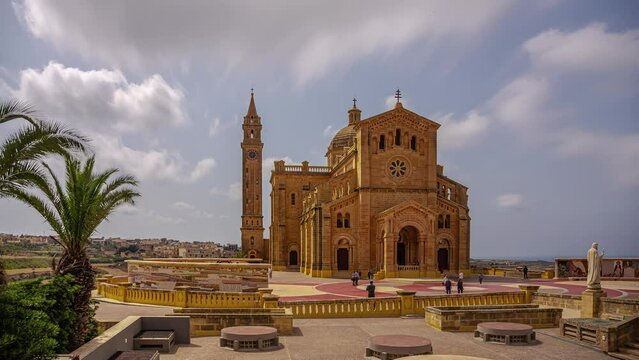 Astounding Architecture Of Basilica Of The Blessed Virgin Of Ta' Pinu Seen From The Distance During Daytime In Gozo, Malta. timelapse, static