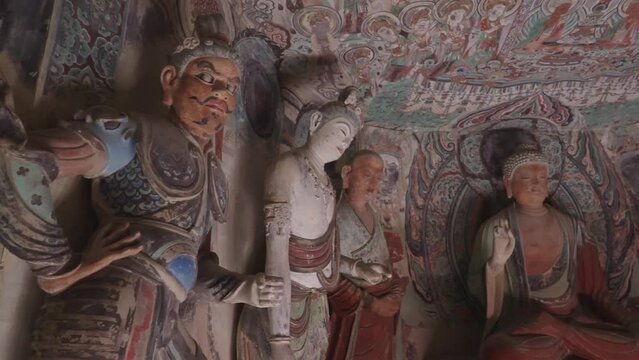 Statues of Buddha in the Mogao Grottoes of Dunhuang, Gansu, China Dunhuang