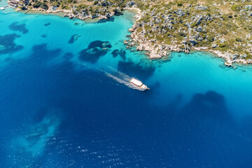 Naklejka na ściany i meble Aerial view of seacoast with many yachts and sailing boats