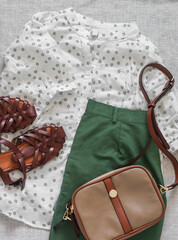 A set of women's comfortable clothes for city walks - cotton bermuda shorts, braided leather...