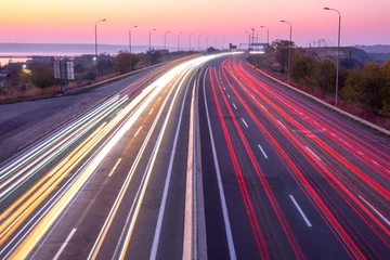Deurstickers Snelweg bij nacht Sunset Car Traffic With Trails on a Suburban Highway