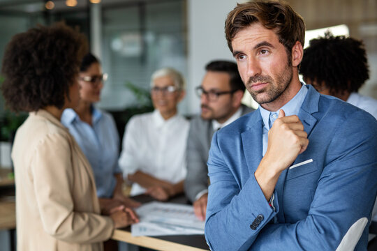 Portrait Of Frustrated Stressed Business Man Working In Corporate Office