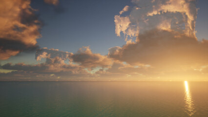 夕陽に輝く穏やかな海と大きな雲