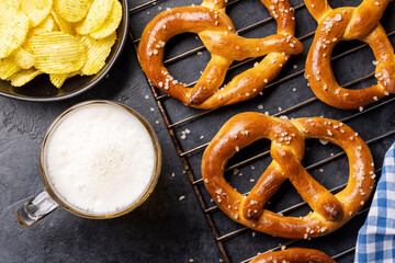 Freshly baked homemade pretzels and draft beer