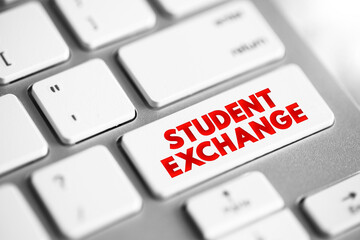 Student Exchange - program in which students from a secondary school or university study abroad at one of their institution's partner institutions, text button on keyboard