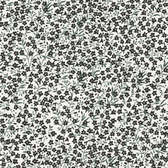 Cute floral pattern of small black flowers. Seamless vector texture. An elegant template for fashionable prints. Print with small black flowers and green leaves on a light background.