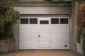 Garage door. Luxury and modern house with double garage door in Europe.