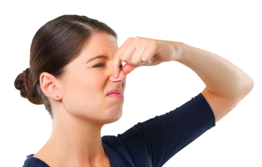 Foto op Canvas Holding nose, disgust or woman frustrated by bad smell or odor isolated on transparent png background. Face, bad breath or girl with gross, smelly or disgusted expression for stink, scent or aroma © Sumeet/peopleimages.com