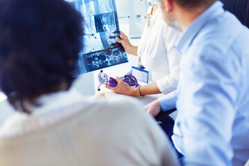 Medical doctor looking at a x-ray image in the office