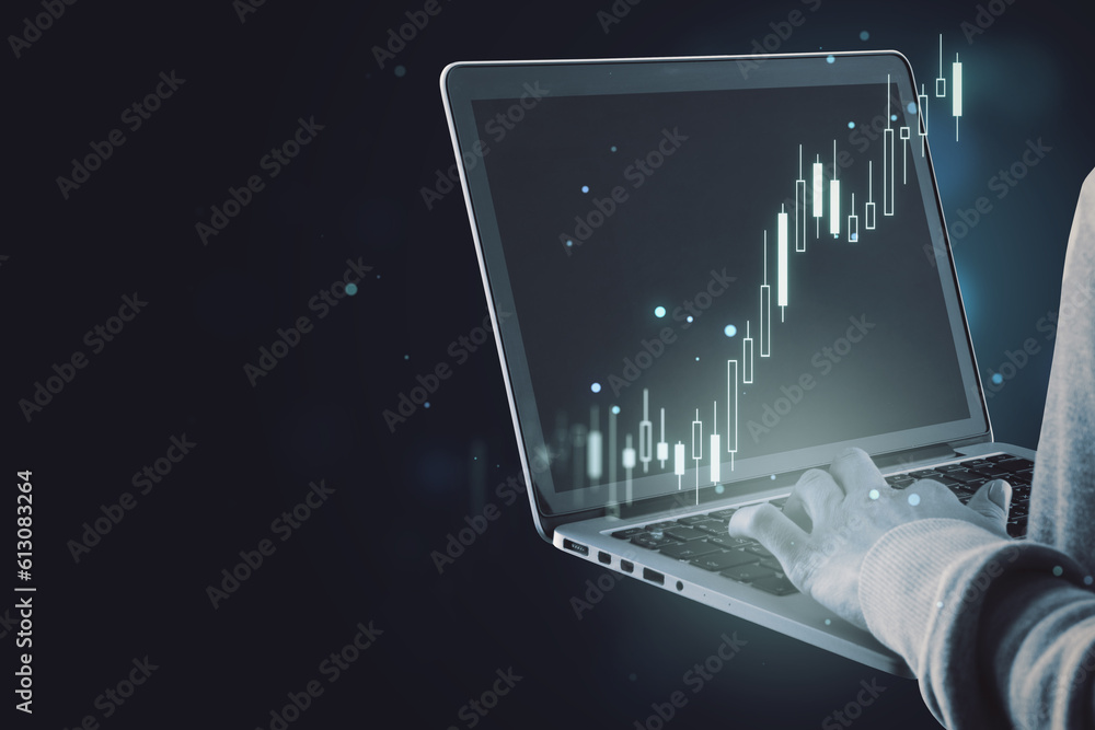 Aufkleber close up of female hand using laptop with glowing candlestick forex chart index on blurry dark bokeh