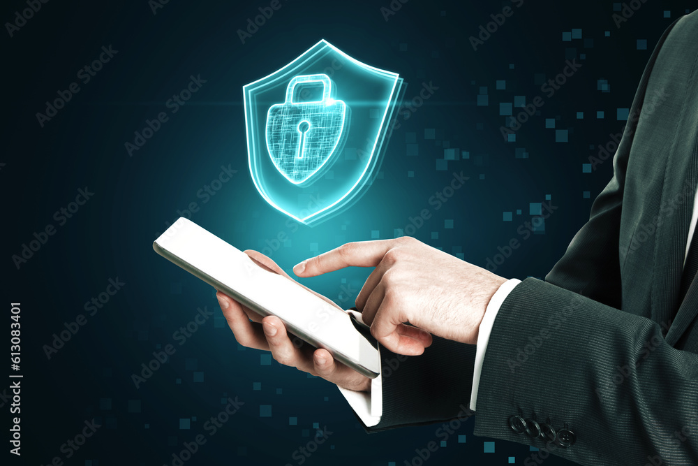 Aufkleber Cyber security and internet protection access concept with glowing keyhole inside closed padlock and shield hologram above businessman using digital tablet on abstract dark pixel background