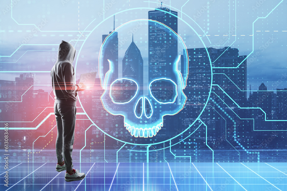 Aufkleber Hacker with laptop standing on abstract toned city background with bue circuit skull hologram. Hacking and data theft concept. Double exposure.