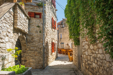 Romantic old street in historic town of Pakostane in Dalmatia, Croatia