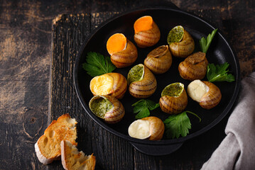 Baked snails Escargot with bread