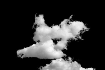 white fluffy clouds standing out against a black background and a blue sky