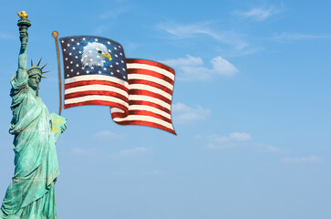 United States of America flag ,bald eagle and statue of liberty on blue sky background.