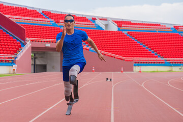 Willful Asian male athlete with prosthetics takes off speedily to surpass his running record on...