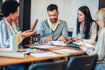 Modern business team discussing new ideas at the office. Business people on meeting in modern office.