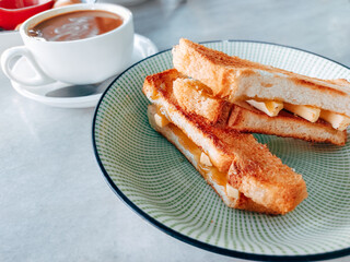 Asian Toast bread (Roti bakar) with butter and kaya with coffee